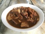 A bowl of luzhu huoshao, or stewed bread and offal, in Beijing, China